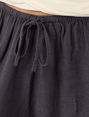Pantalón ancho de mujer con cintura elástica y bajo ajustado