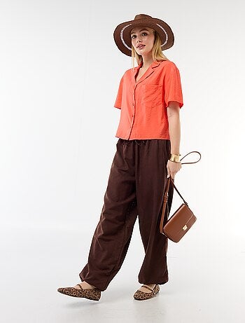 Pantalón ancho de mujer con cintura elástica y bajo ajustado