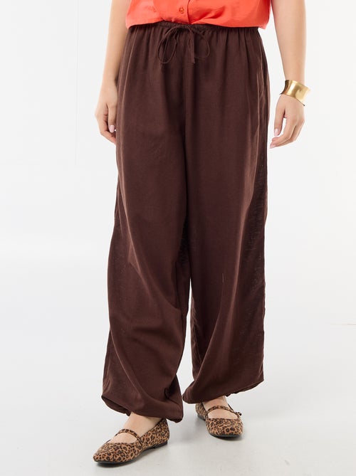 Pantalón ancho de mujer con cintura elástica y bajo ajustado - Kiabi