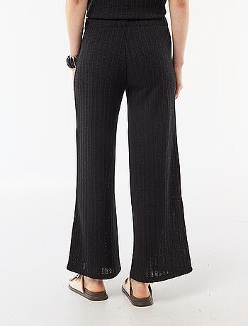 Pantalón ancho de punto calado