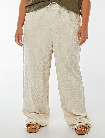 Pantalón ancho de punto con relieve en mezcla de lino