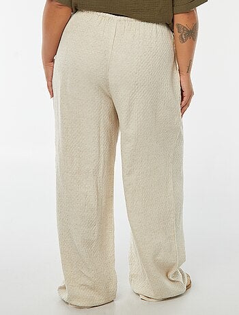 Pantalón ancho de punto con relieve en mezcla de lino