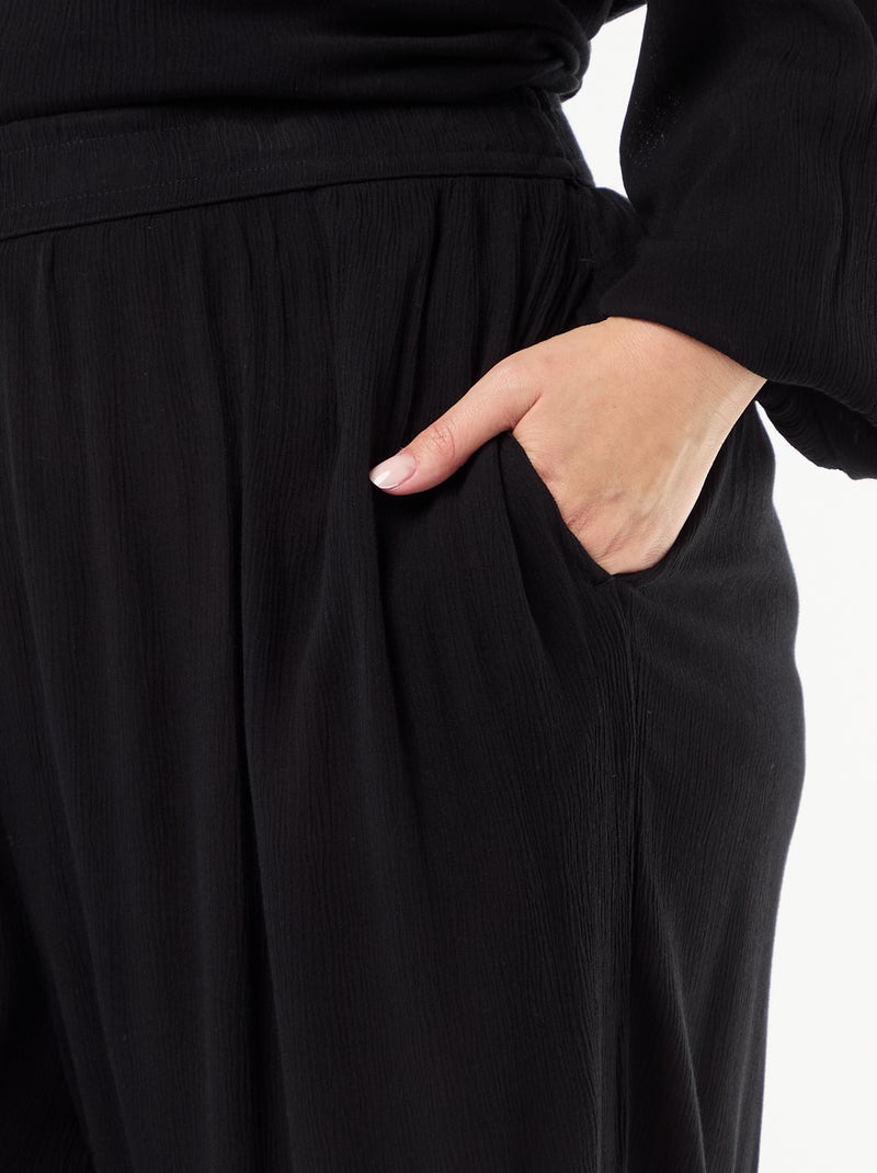Pantalón ancho de punto crepé Negro - Kiabi