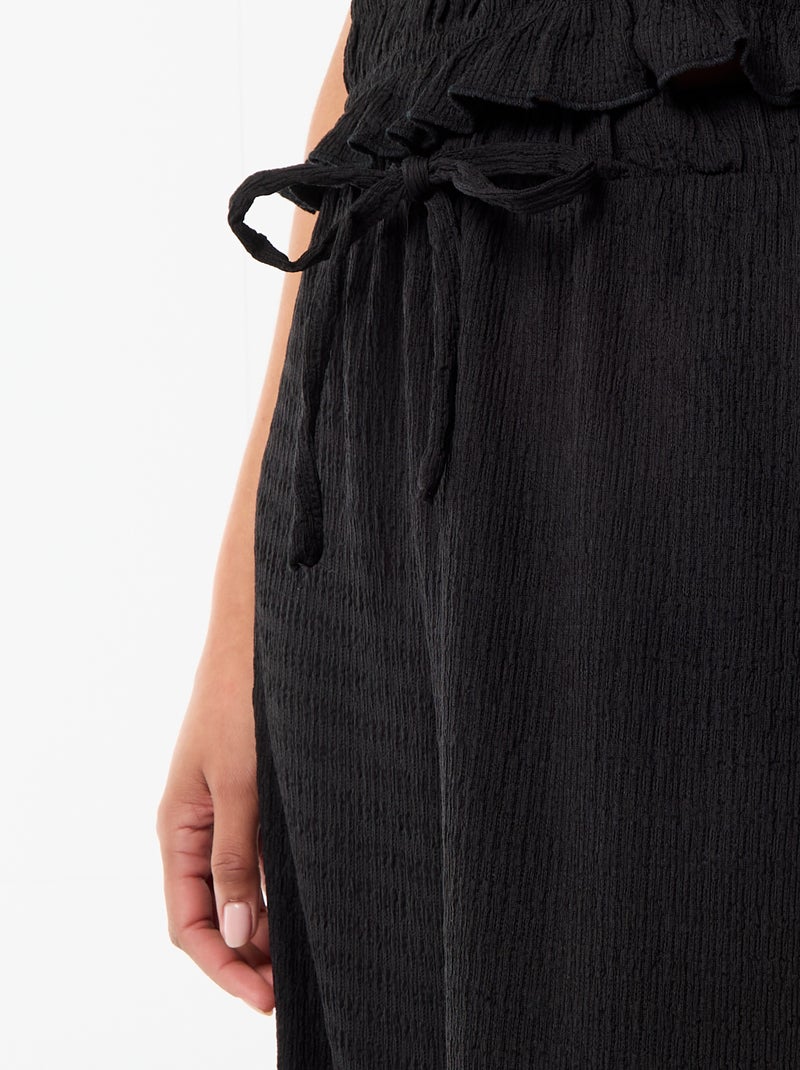 Pantalón ancho de punto smock Negro - Kiabi
