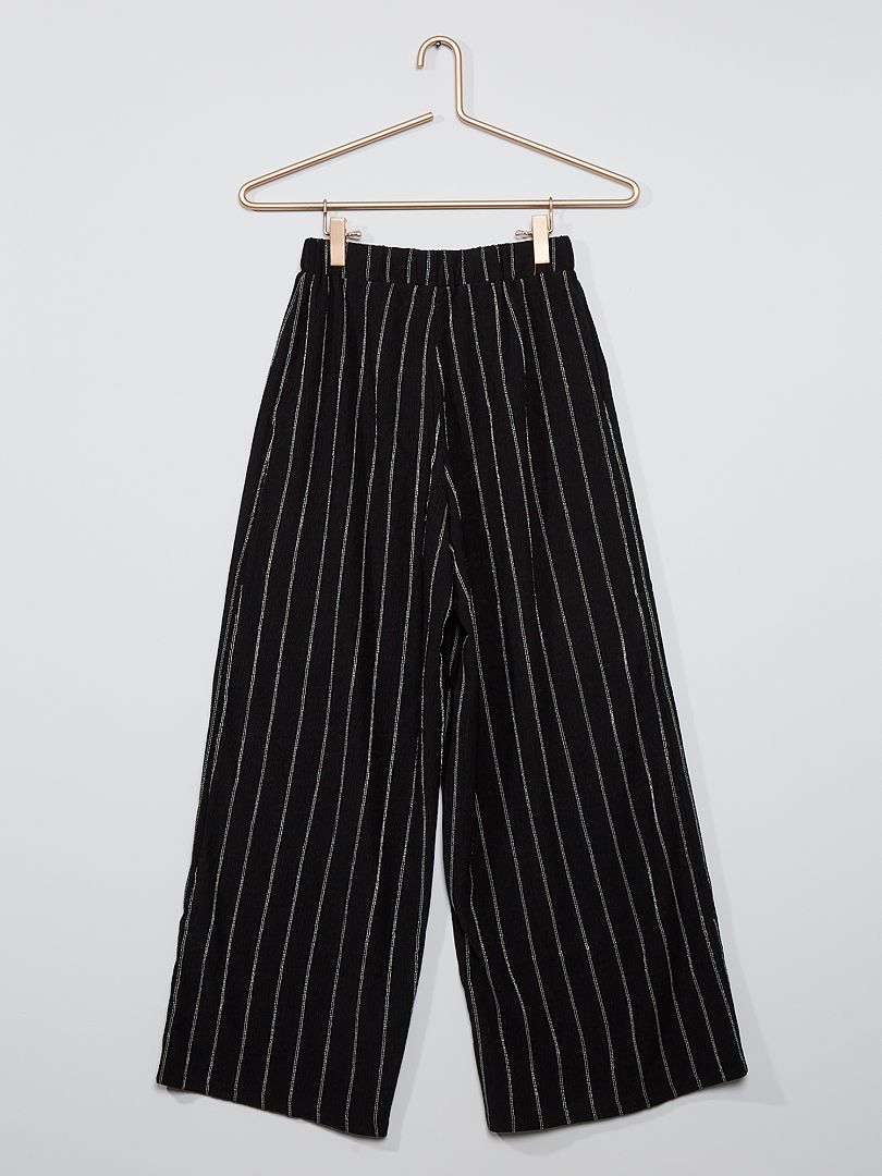 Pantalon negro con online rayas