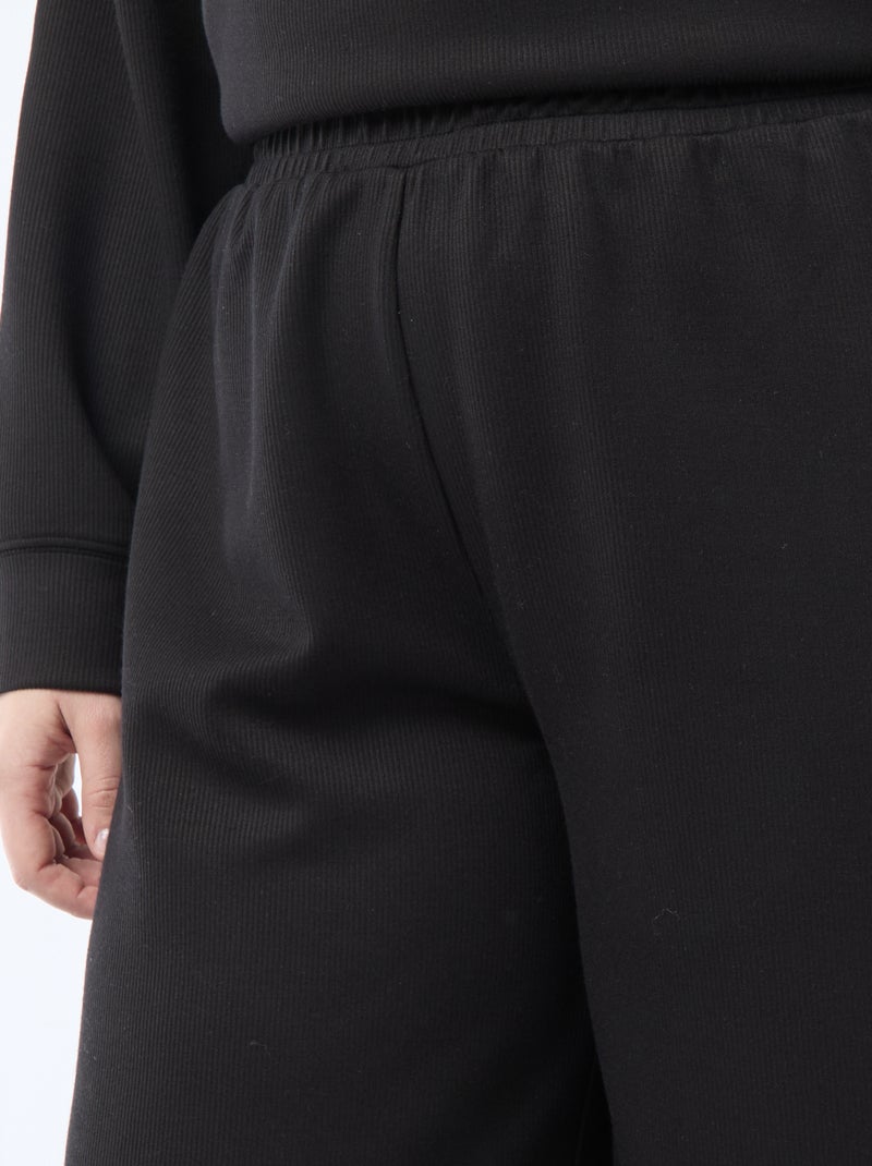 Pantalón ancho de tejido elástico de canalé Negro - Kiabi