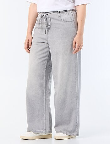 Pantalón ancho de vaquero con cinturón para anudar