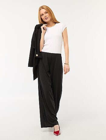 Pantalón ancho fluido con bandas laterales de encaje
