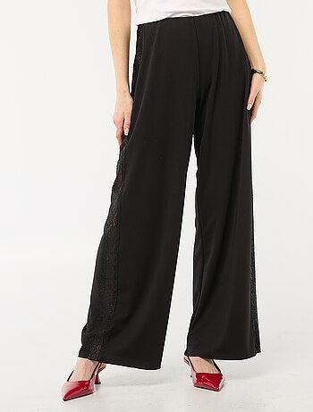 Pantalón ancho fluido con bandas laterales de encaje