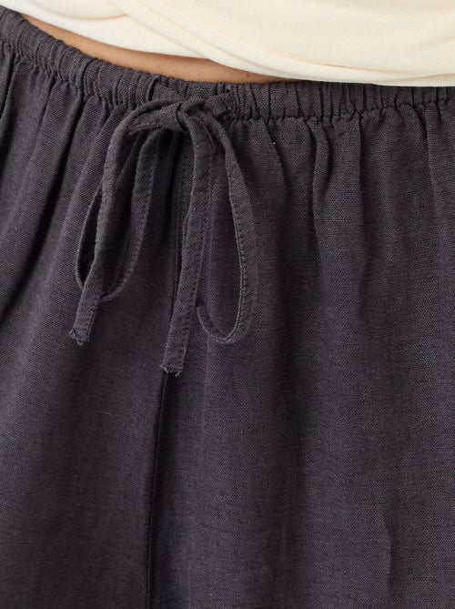 Pantalón ancho liso con cinturón elástico - Kiabi