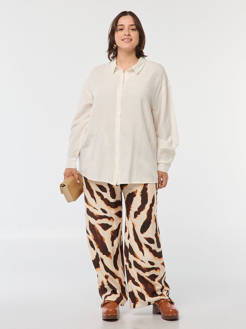 Pantalón ancho vaporoso con motivo all over Beige - Kiabi