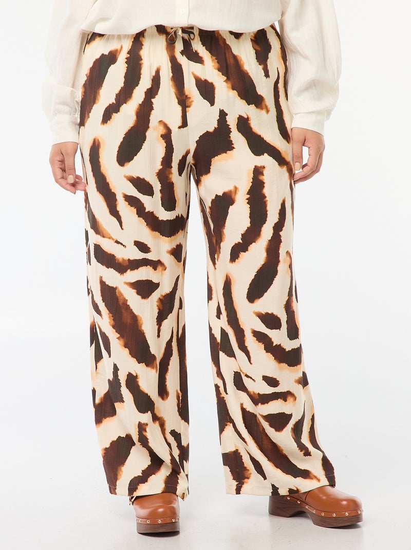 Pantalón ancho vaporoso con motivo all over Beige - Kiabi
