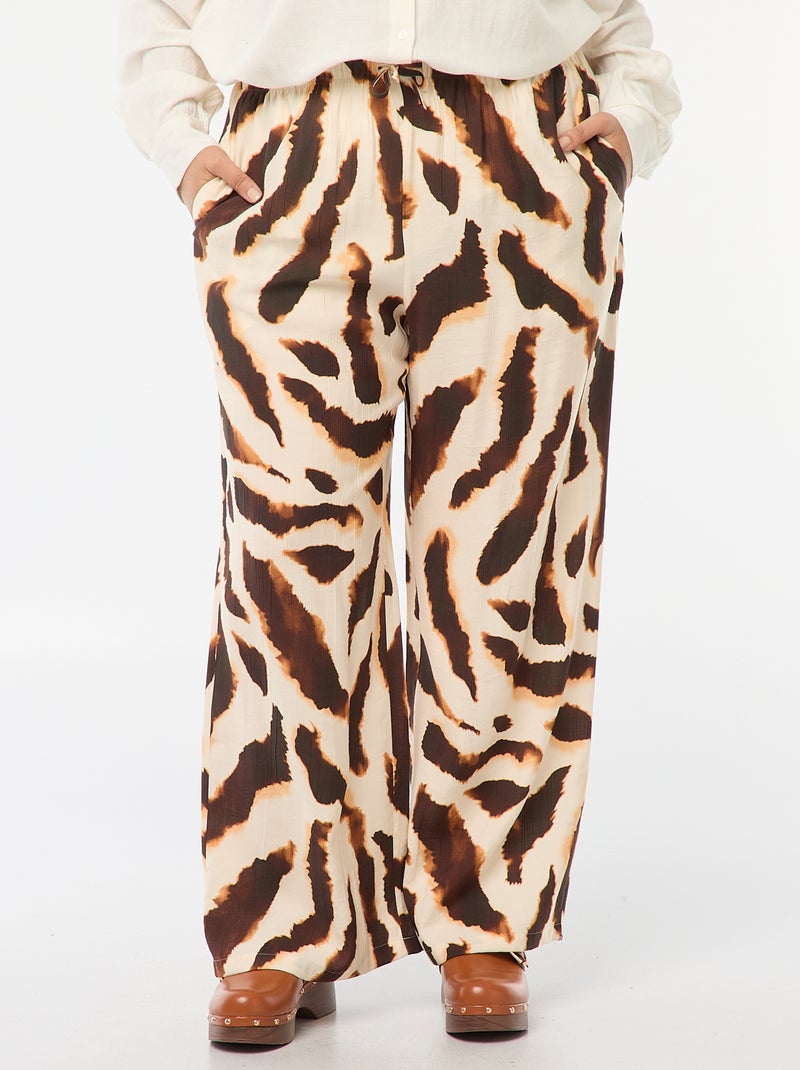 Pantalón ancho vaporoso con motivo all over Beige - Kiabi
