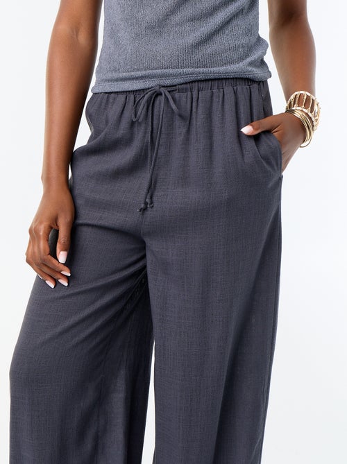 Pantalón bombacho liso con 2 bolsillos - Kiabi