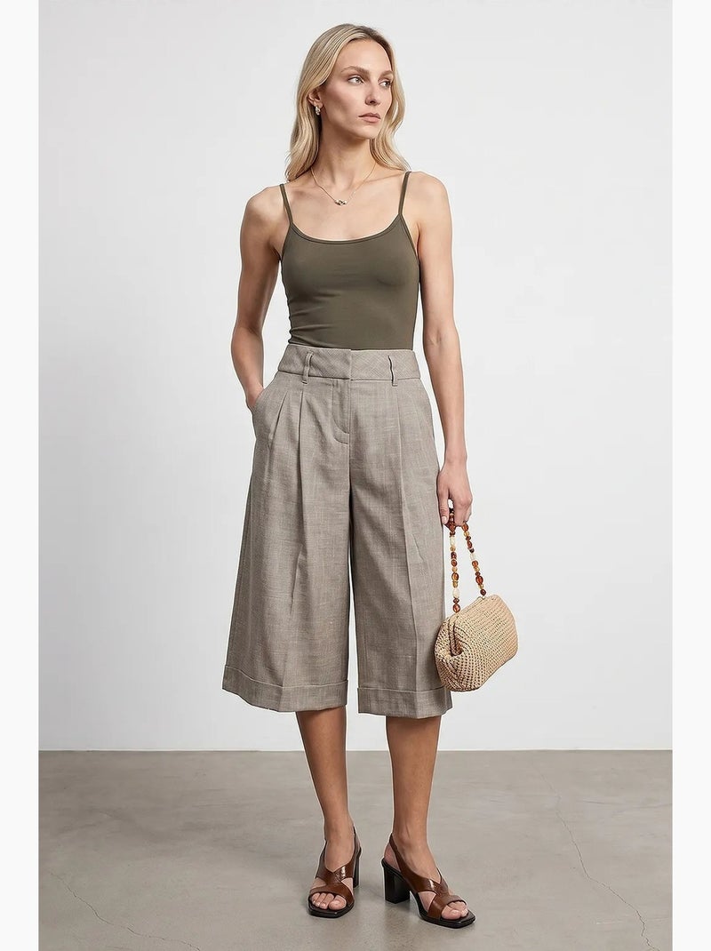 Pantalón capri de tiro alto con pinzas y pernera ancha dilvin Arena - Kiabi
