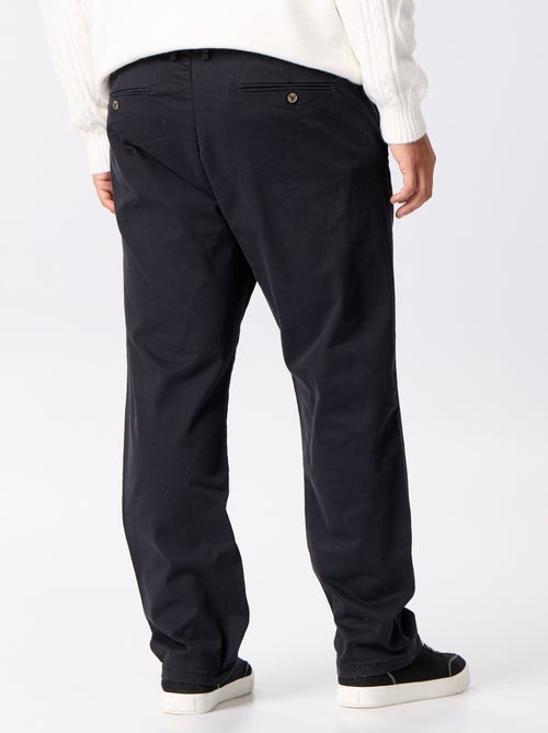 Pantalón chino liso de tiro estándar - Kiabi Pantalón chino liso de tiro estándar - Kiabi