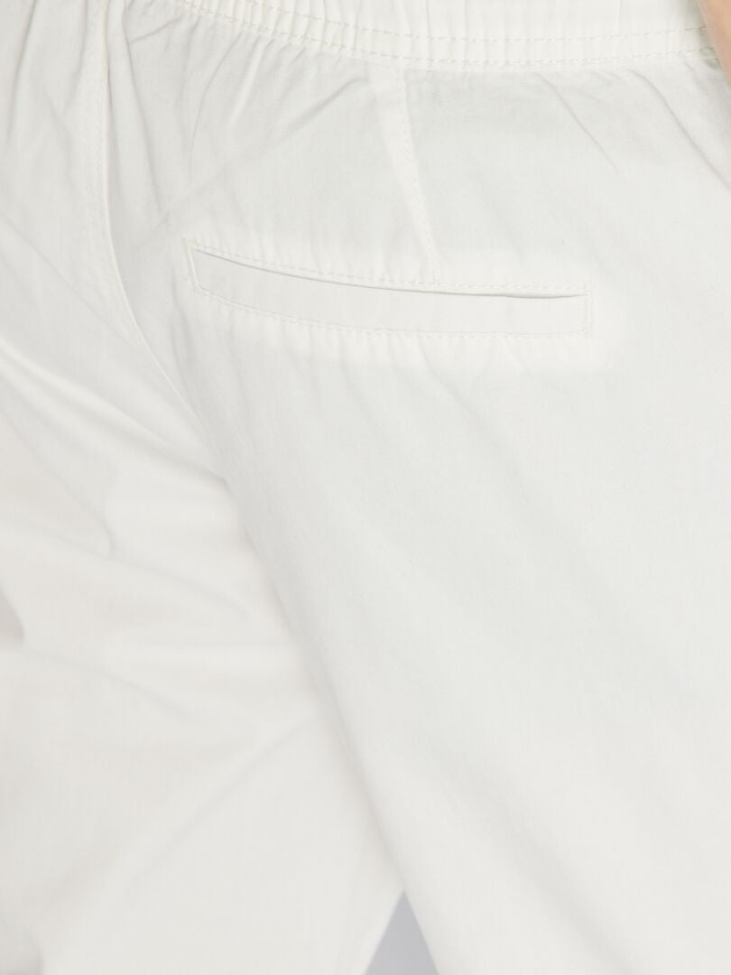 Pantalón chino slim Blanco Kiabi 20.00€