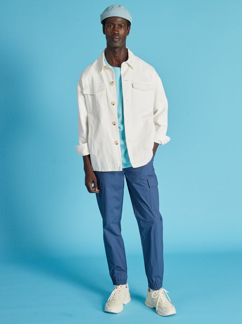 Pantalón con bolsillos en el lateral azul oscuro - Kiabi