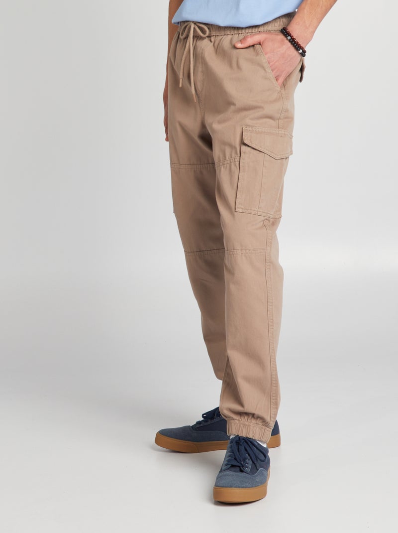 Pantalón con bolsillos en los laterales BEIGE - Kiabi