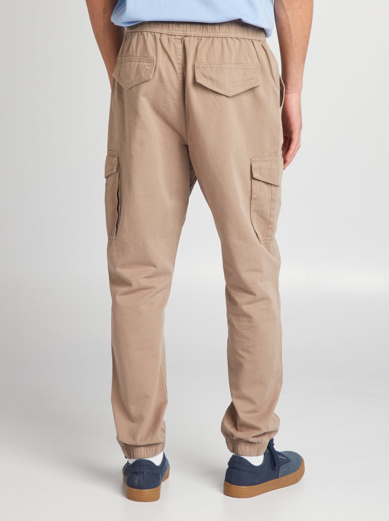 Pantalón con bolsillos en los laterales BEIGE - Kiabi