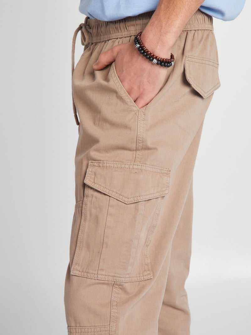 Pantalón con bolsillos en los laterales BEIGE - Kiabi