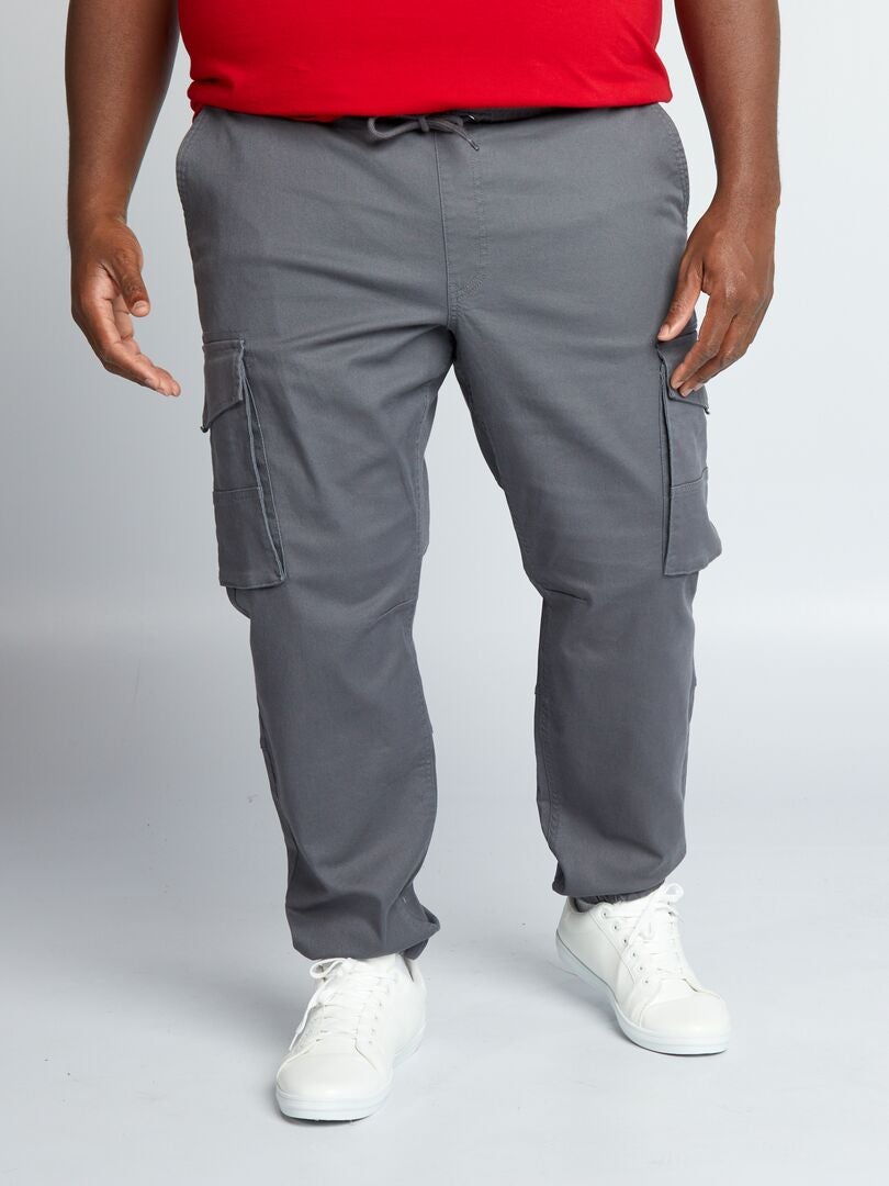 Pantalón con bolsillos en los laterales GRIS - Kiabi