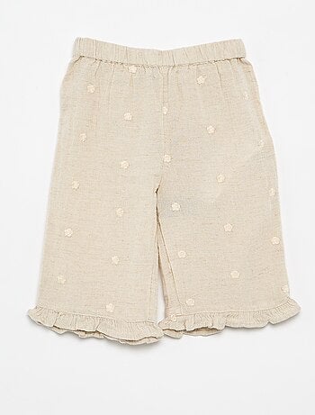 Pantalón con bordados de flores