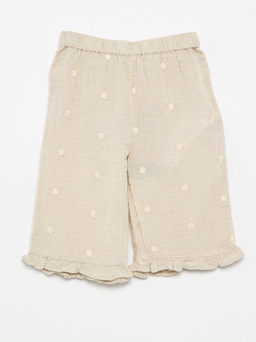 Pantalón con bordados de flores - Kiabi
