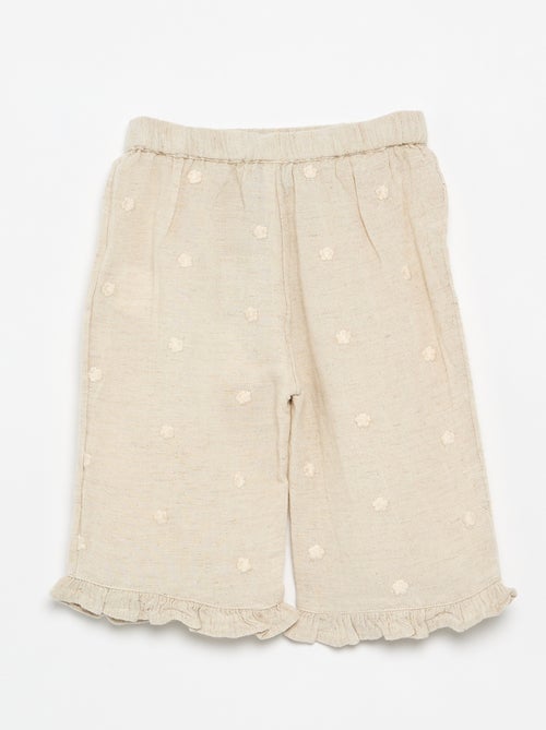 Pantalón con bordados de flores - Kiabi