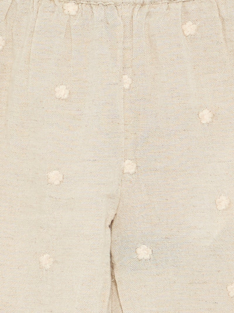 Pantalón con bordados de flores Beige - Kiabi