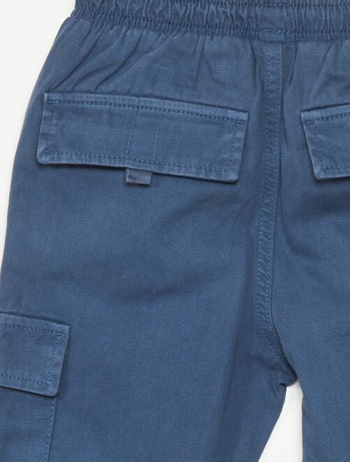 Pantalón con cintura elástica y bolsillos - Kiabi