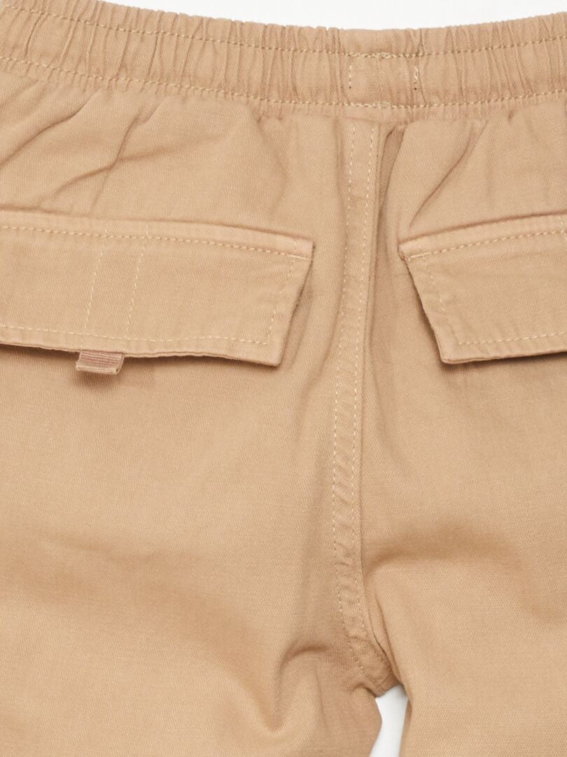 Pantalón con cintura elástica y bolsillos BEIGE - Kiabi