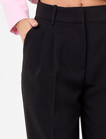 Pantalón corte carrot de tiro alto