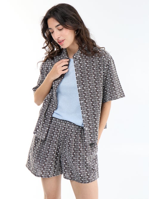 Pantalón corto con bordados y cintura elástica - Kiabi