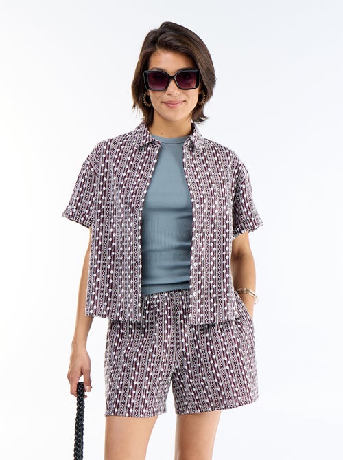 Pantalón corto con bordados y cintura elástica - Kiabi