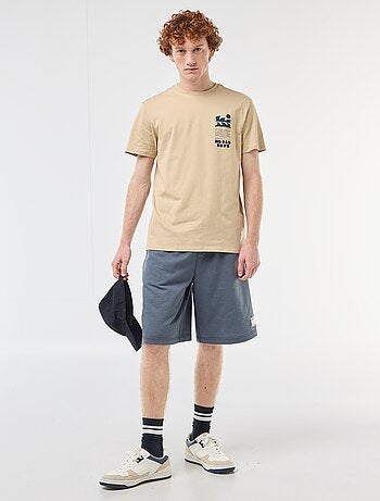 Pantalón corto con parche en algodón liso