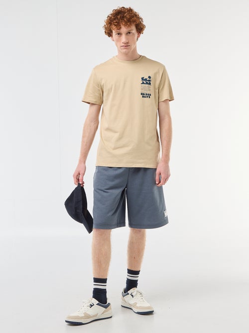 Pantalón corto con parche en algodón liso - Kiabi