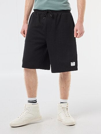 Pantalón corto con parche en algodón liso