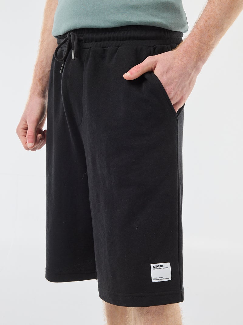 Pantalón corto con parche en algodón liso Negro - Kiabi