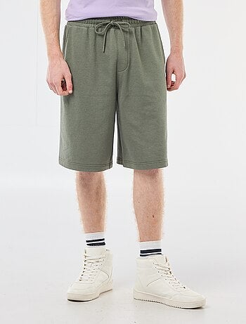 Pantalón corto con parche en algodón liso