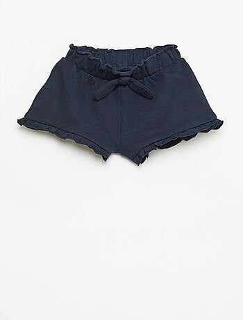 Pantalón corto con volantes y lazo en la cintura