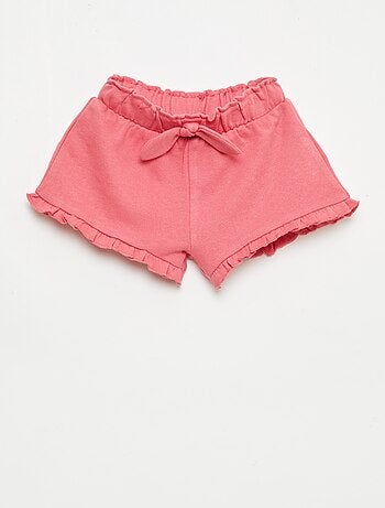 Pantalón corto con volantes y lazo en la cintura