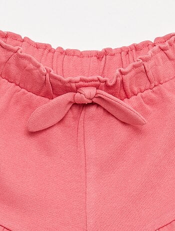 Pantalón corto con volantes y lazo en la cintura