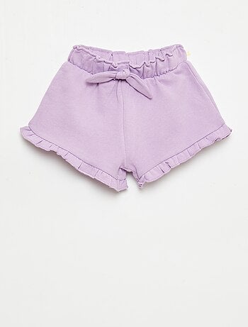 Pantalón corto con volantes y lazo en la cintura