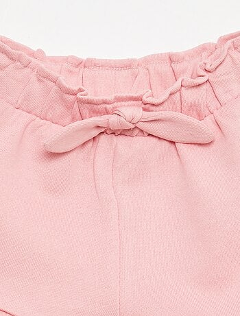 Pantalón corto con volantes y lazo en la cintura