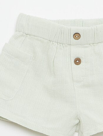 Pantalón corto de algodón con 2 bolsillos de parche