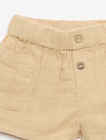 Pantalón corto de algodón con 2 bolsillos de parche