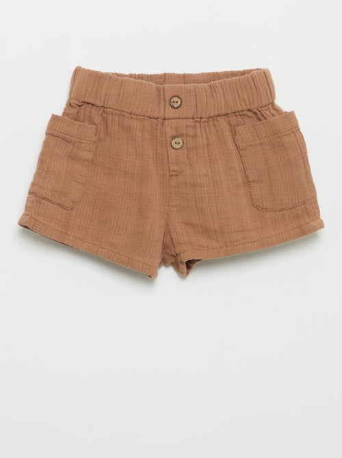 Pantalón corto de algodón con 2 bolsillos de parche - Kiabi Pantalón corto de algodón con 2 bolsillos de parche - Kiabi