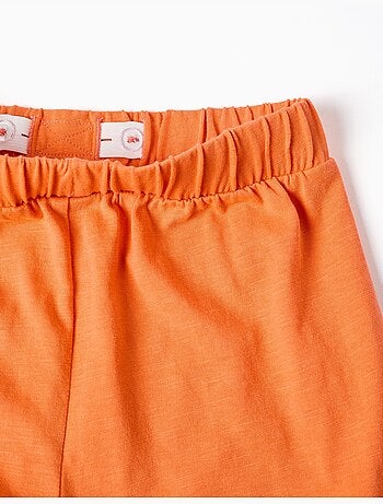 Pantalón corto de algodón con cintura elástica y con volantes