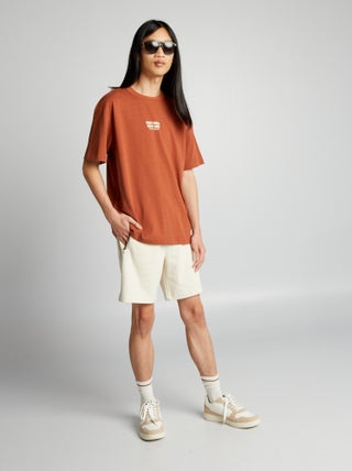 Pantalón corto de chándal con bolsillos con cremallera